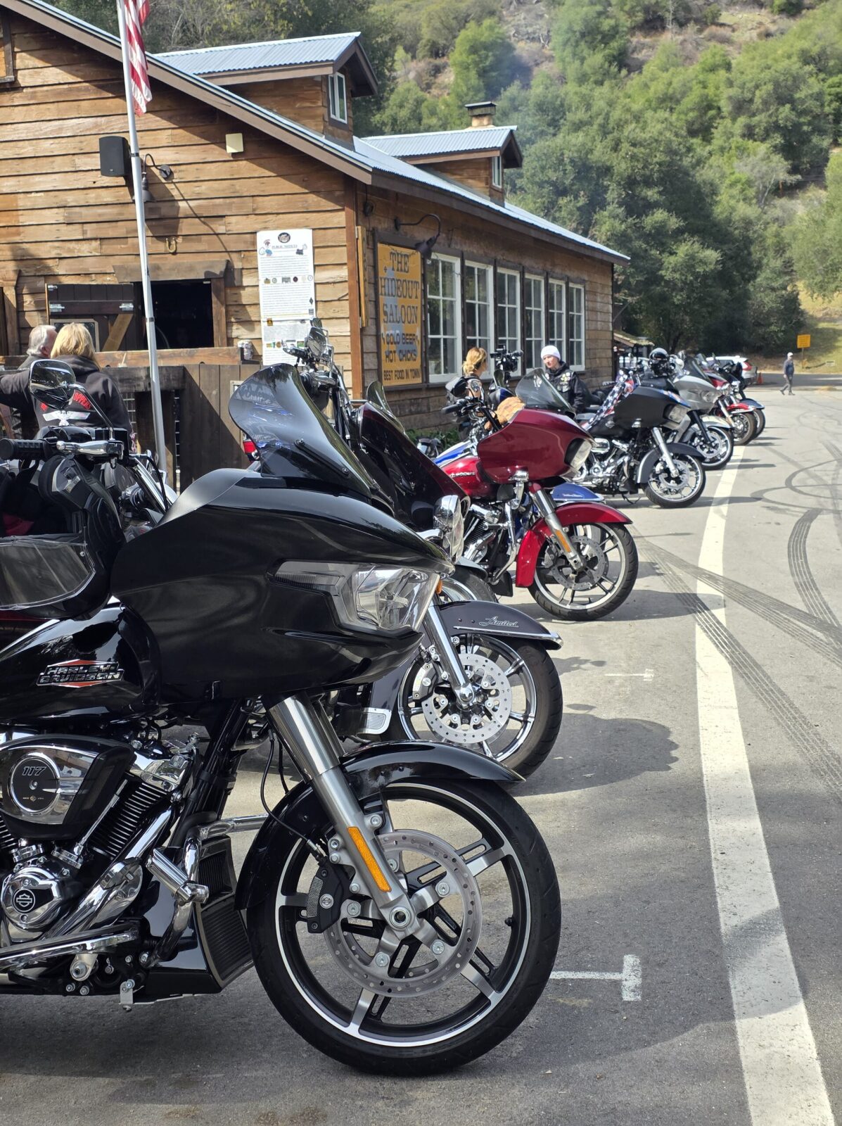 Motorcycles lined up along Highway 76 outside the Hideout Saloon